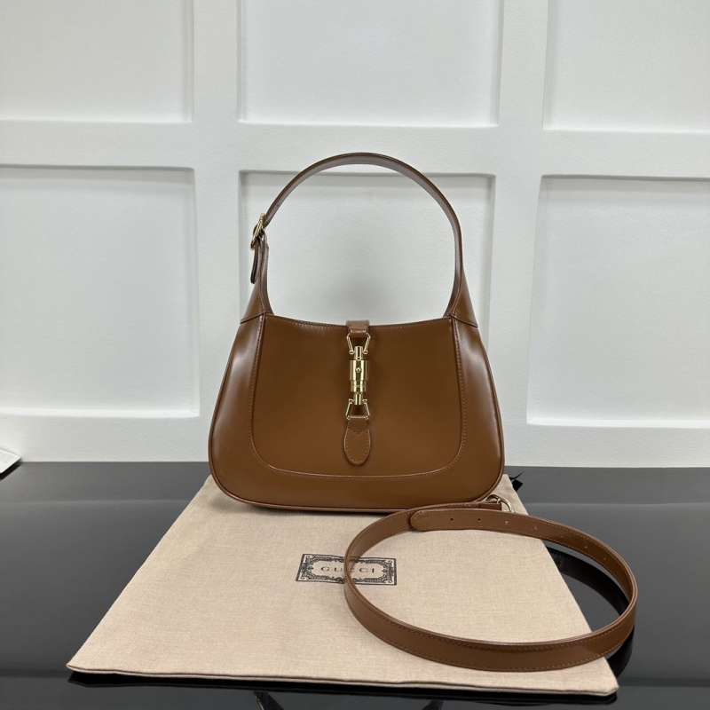 G*u*i top handle bags